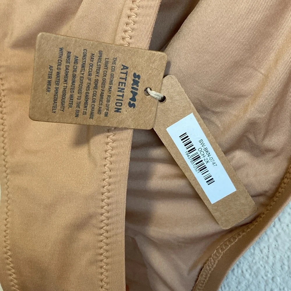 SKIMS Signature Swim Cheeky Tanga Bottoms in Ochre (Size 2X)